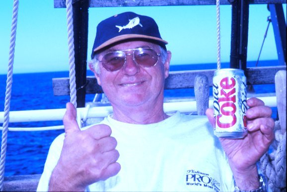 After the Great White Shark attack, broken ribs, a punctured lung, broken clavicle, severe blood loss, and over 450 stitches, Rodney Fox still enjoys drinking Coca Cola with his friends and crew. 