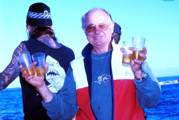 After the Great White Shark attack, broken ribs, a punctured lung, broken clavicle, severe blood loss, and over 450 stitches, Rodney Fox still enjoys drinking Coca Cola with his friends and crew. 